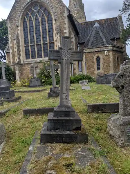 Cross with Celtic knot tombstone in cemetery, London